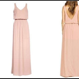 Never worn, bought the wrong size. Amazing dress!